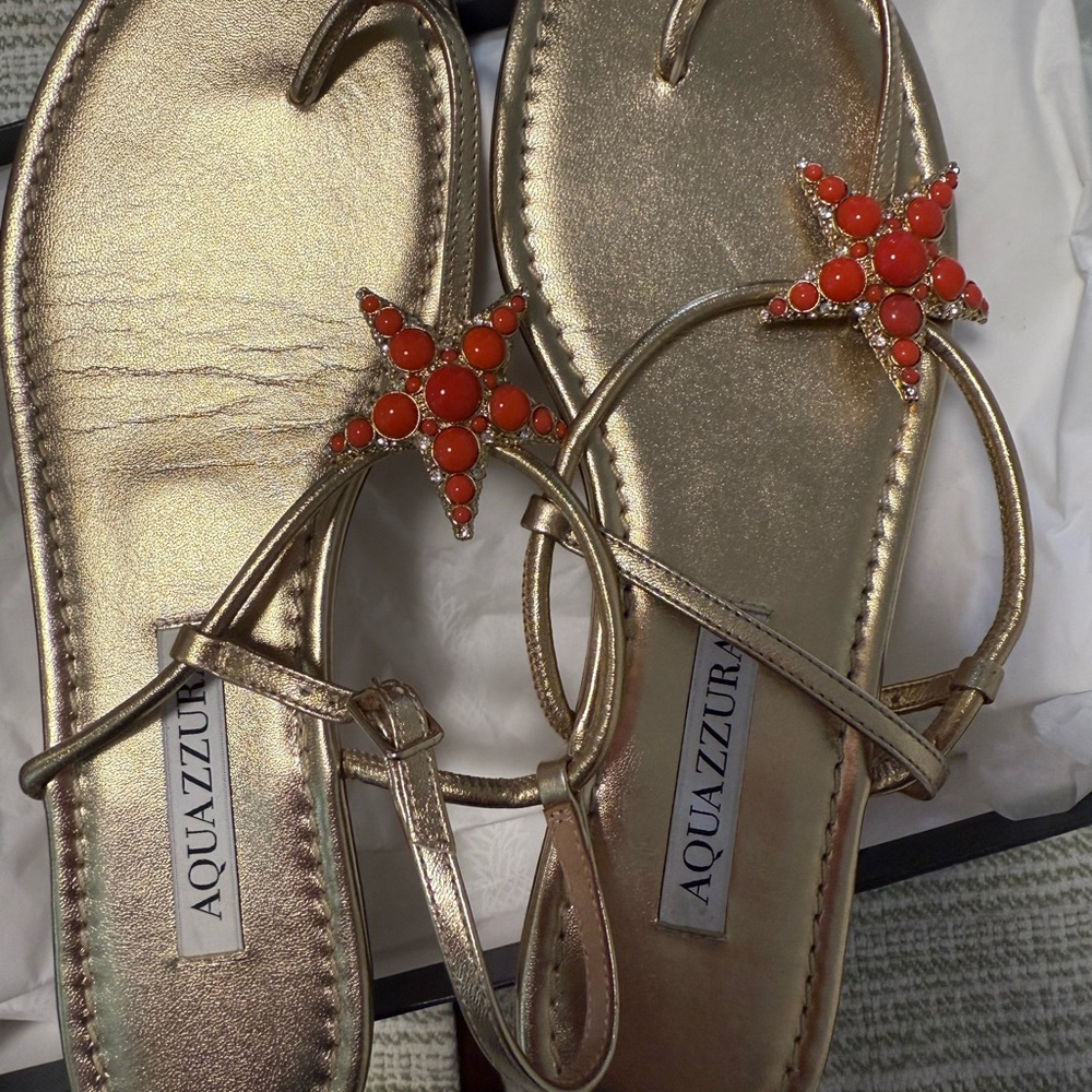 Aquazzura Gold Sandals with Red Star Embellishments